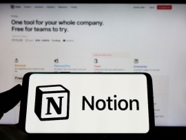 Notion project management on a phone and a computer screen.